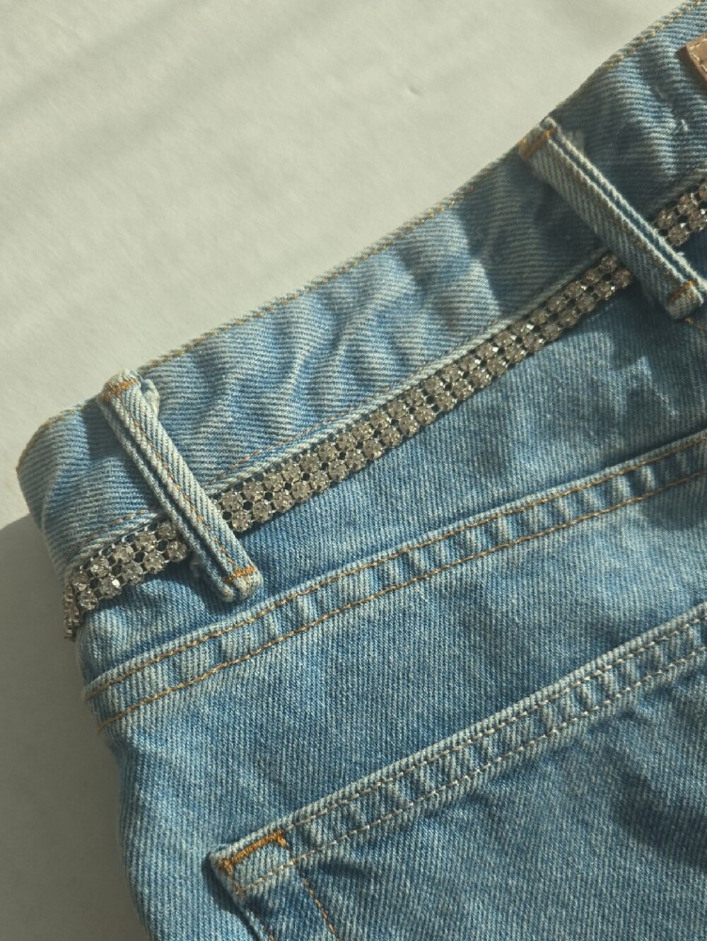 GRLFRND Washed Blue Denim Mini Skirt with Rhinestone Waist Chain - Picture 5 of 9